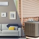 Modern living room with air conditioning unit, couch, and wall art, showcasing HVAC comfort for homeowners.